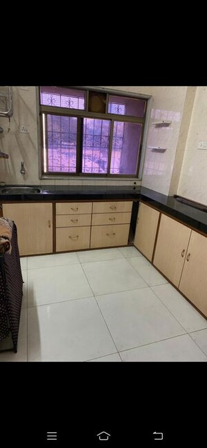 Kitchen in 1 BHK Apartment at Adarsh Nagar Society, Worli – for Rent