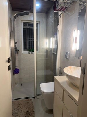 Bathroom in 2 BHK Apartment at Model Town, Andheri West – for Rent