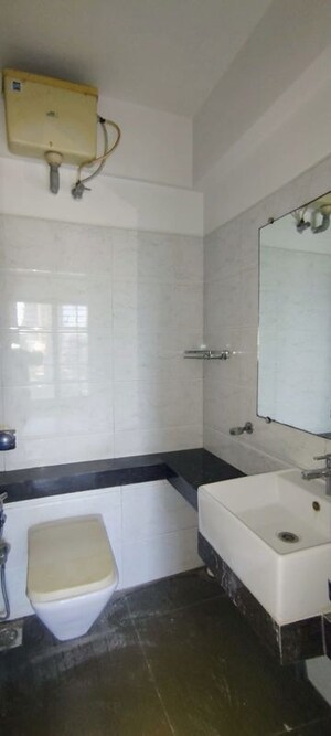 Bathroom in 3 BHK Apartment at Runwal Codename Rare, Andheri West – for Sale
