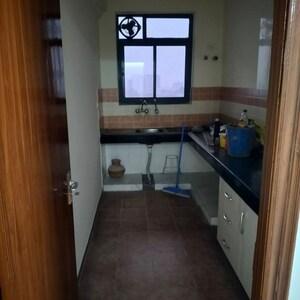 Kitchen in 2 BHK Apartment at Cosmos Executive, Sector 3 – for Sale