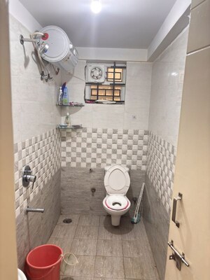 Bathroom in 2 BHK Apartment at Siri Green Woods, Electronic City Phase I – for Sale