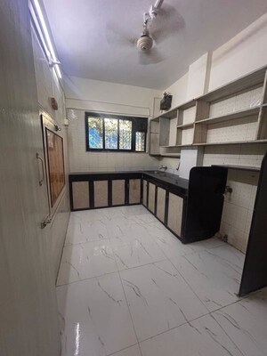 Kitchen in 1 BHK Apartment at Radha Apartment Vile Parle, Vile Parle West – for Rent