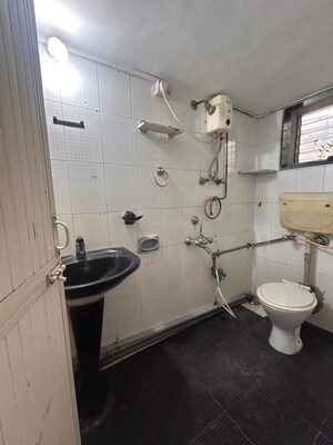 Bathroom in 1 BHK Apartment at Radha Apartment Vile Parle, Vile Parle West – for Rent