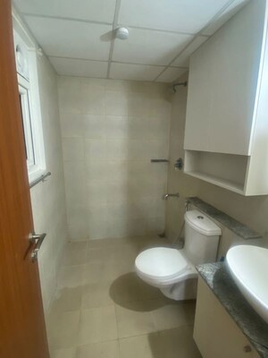 Bathroom in 2.5 BHK Apartment at Bhartiya Nikoo Homes Phase 2, Thanisandra Main Road – for Rent