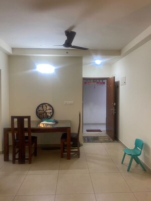 Living Room in 2.5 BHK Apartment at Bhartiya Nikoo Homes Phase 2, Thanisandra Main Road – for Rent
