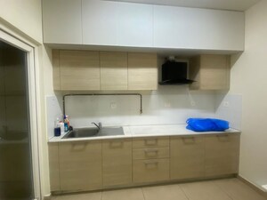 Kitchen in 2.5 BHK Apartment at Bhartiya Nikoo Homes Phase 2, Thanisandra Main Road – for Rent