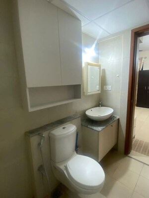 Bathroom in 2.5 BHK Apartment at Bhartiya Nikoo Homes Phase 2, Thanisandra Main Road – for Rent