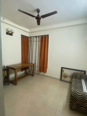 Living Room in 2.5 BHK Apartment at Bhartiya Nikoo Homes Phase 2, Thanisandra Main Road – for Rent