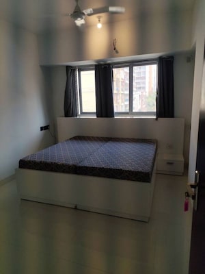 Bedroom in 2 BHK Apartment at UK Sangfroid, Andheri West – for Rent