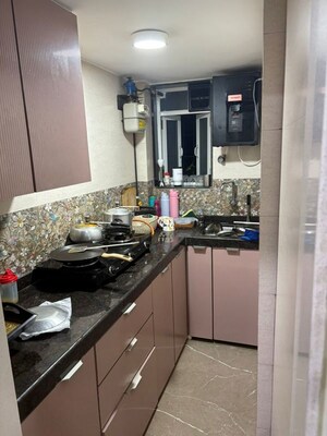 Kitchen in 2 BHK Apartment at Mamta Apartment Andheri, Andheri West – for Rent