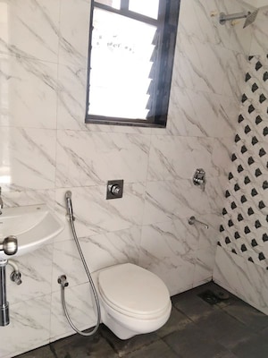 Bathroom in 1 BHK Apartment at UK Iridium, Kandivali East – for Rent