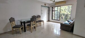 Living Room in 2 BHK Apartment at Andheri CHS, Andheri West – for Rent