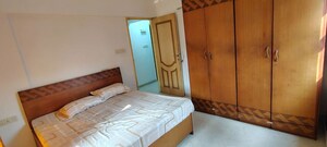 Bedroom in 2 BHK Apartment at Andheri CHS, Andheri West – for Rent