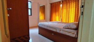 Bedroom in 2 BHK Apartment at Andheri CHS, Andheri West – for Rent