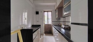 Kitchen in 2 BHK Apartment at Andheri CHS, Andheri West – for Rent