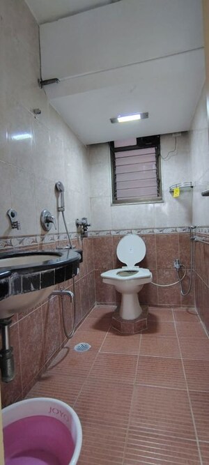 Bathroom in 2 BHK Apartment at Andheri CHS, Andheri West – for Rent