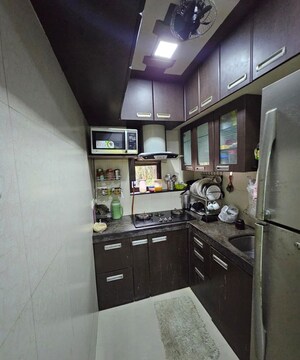 Kitchen in 1.5 BHK Apartment at Nahars Everest, Versova – for Rent