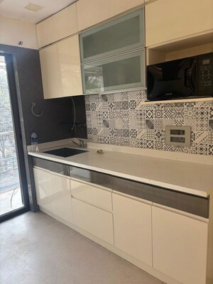 Kitchen in 2 BHK Apartment at Jaycee Bhagtani Elegance, Andheri West – for Rent