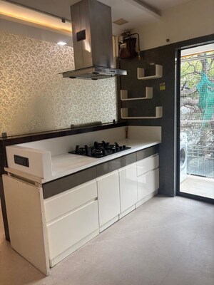 Kitchen in 2 BHK Apartment at Jaycee Bhagtani Elegance, Andheri West – for Rent