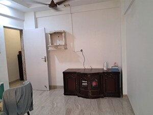 Kitchen in 1 BHK Apartment at Andheri CHS, Andheri West – for Rent