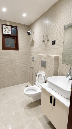 Bathroom in 4 BHK Builder Floor at Chattarpur – for Rent