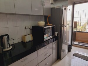 Kitchen in 2 BHK Apartment at Bhagtani Heights, Versova – for Rent