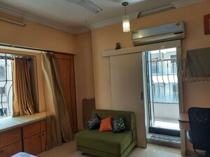 Living Room in 2 BHK Apartment at Bhagtani Heights, Versova – for Rent