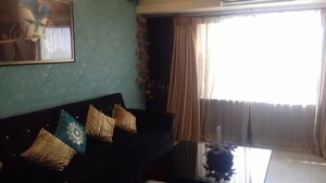 Living Room in 2 BHK Apartment at Bhagtani Heights, Versova – for Rent