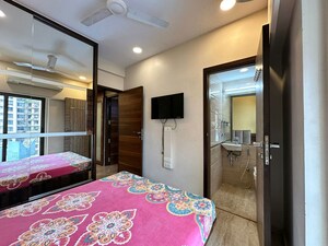 Bedroom in 4 BHK Apartment at Cosmopolis Tower, Andheri West – for Rent