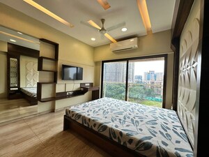 Bedroom in 4 BHK Apartment at Cosmopolis Tower, Andheri West – for Rent