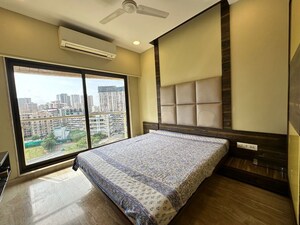 Bedroom in 4 BHK Apartment at Cosmopolis Tower, Andheri West – for Rent