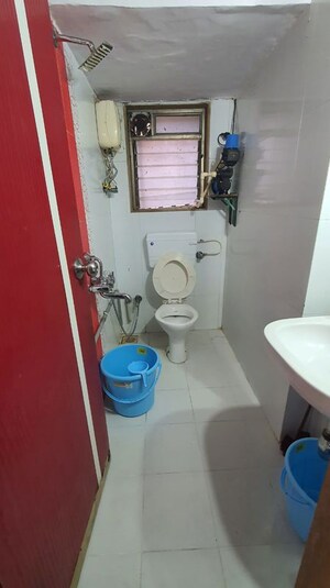 Bathroom in 2 BHK Apartment at Andheri CHS, Andheri West – for Rent