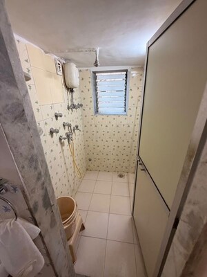 Bathroom in 1 BHK Apartment at Deepak Mahal CHS, Worli – for Rent