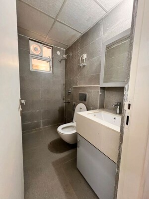 Bathroom in 2 BHK Apartment at Smart World Orchard, Sector 61 – for Rent