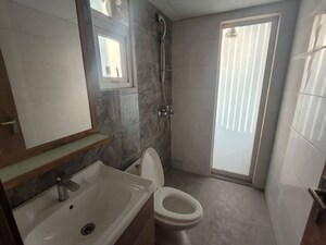 Bathroom in 2 BHK Apartment at Smart World Orchard, Sector 61 – for Rent