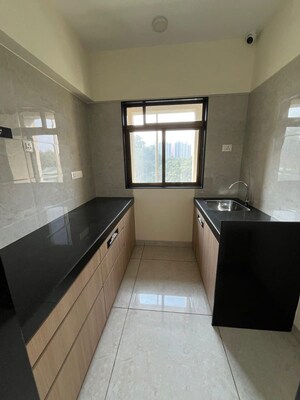 Kitchen in 1 BHK Apartment at Chandak Highscape City, Chembur – for Sale