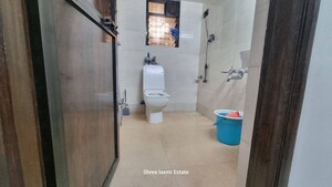 Bathroom in 3 BHK Apartment at Malad Apartment, Malad West – for Rent