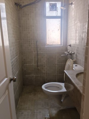 Bathroom in 2 BHK Apartment at Paras Tierea, Sector 137 – for Rent