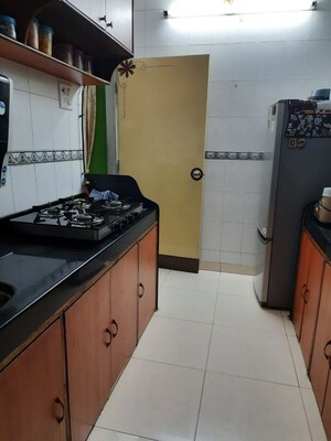 Kitchen in 2 BHK Apartment at Subham Galaxy Kopar Khairane, Kopar Khairane – for Rent
