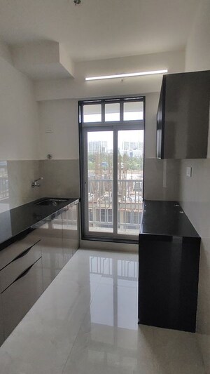 Kitchen in 1 BHK Apartment at Kawali Ravikiran, Vasai West – for Sale