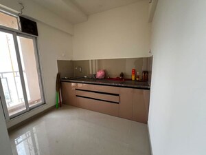 Kitchen in 1.5 BHK Apartment at Godrej Emerald, Ghodbunder Road – for Sale