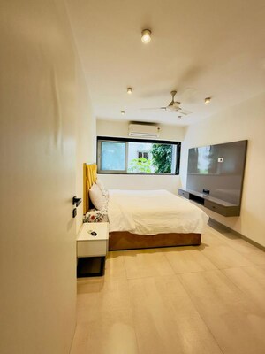 Bedroom in 2 BHK Apartment at Venetia Jamnagar CHS, Vile Parle West – for Rent