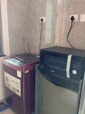Kitchen in 2 BHK Apartment at Sheth Auris Bliss, Malad West – for Rent