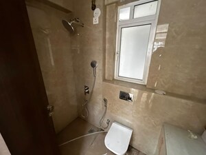 Bathroom in 2 BHK Apartment at Mandar Apartments, Andheri West – for Rent