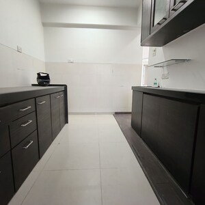 Kitchen in 4 BHK Apartment at Sheth Golden Willows, Mulund West – for Rent