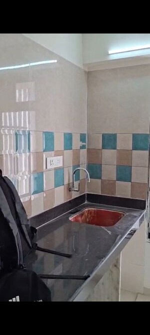 Kitchen in 1 BHK Apartment at Puneet Shivalaya, Tagore Nagar – for Rent