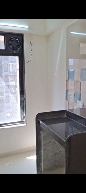 Kitchen in 1 BHK Apartment at Puneet Shivalaya, Tagore Nagar – for Rent