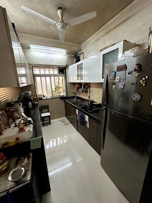 Kitchen in 2 BHK Apartment at Romell Diva, Malad West – for Sale