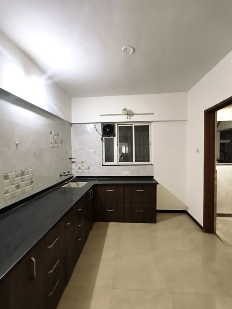 Kitchen, casa-imperia 2 Bedroom 726 Sq.Ft. Apartment In Wakad Pune 10796679