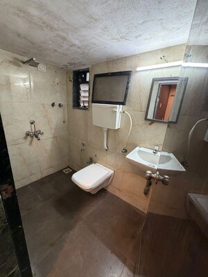 Bathroom in 2 BHK Apartment at RNA NG Paradise, Mira Road – for Rent
